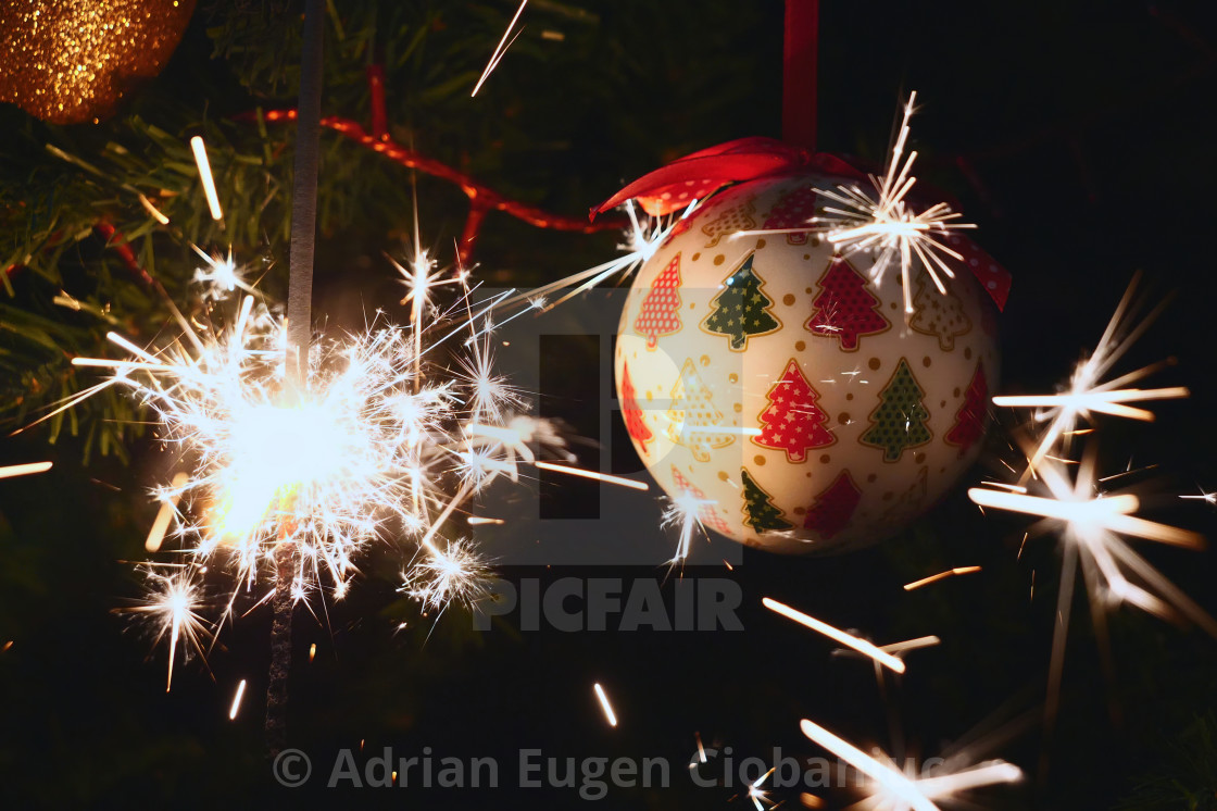 "Sparkler burning on a Christmas tree.Christmas tree decoration" stock image