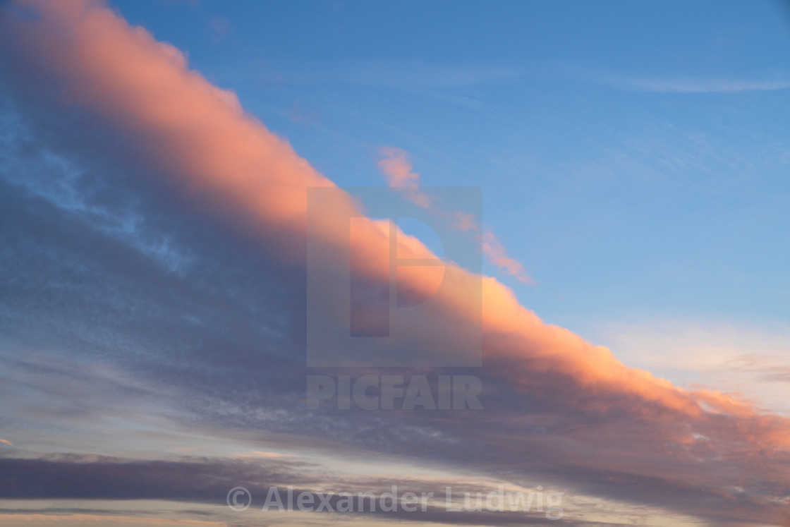 "Sky with pastel-colored clouds" stock image