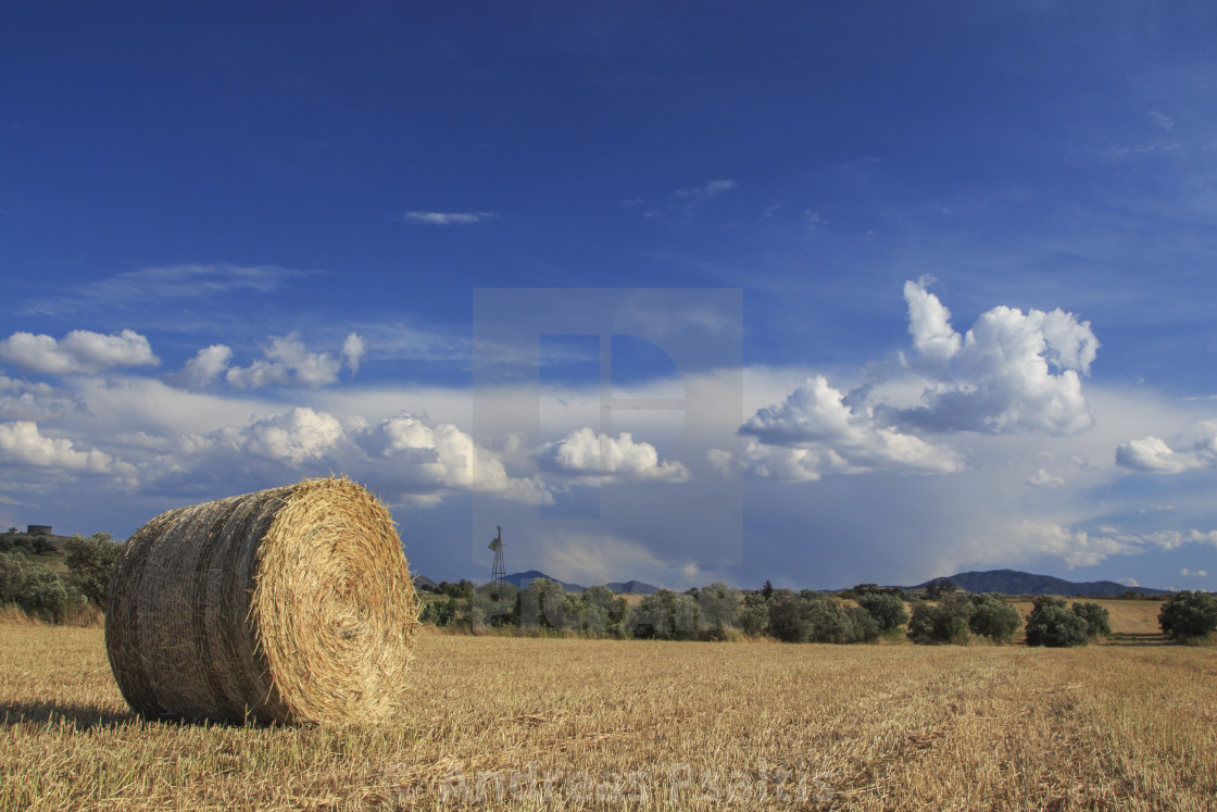 "Hay Bales With Blue Sky And Fluffy Cloud" by Andreas Psaltis - £12.40 "Hay Bales With Blue Sky And Fluffy Cloud" stock image