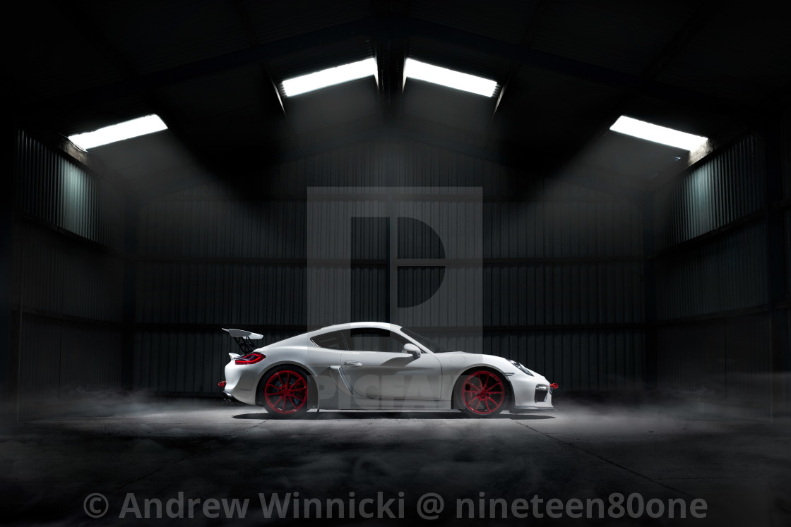 "Sportscar in a dark hangar" stock image