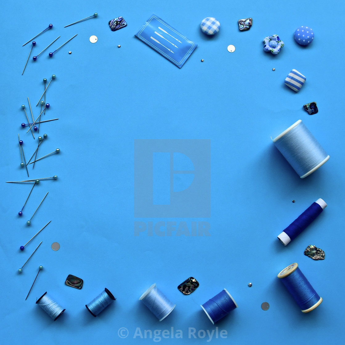 "Blue sewing flatlay." stock image