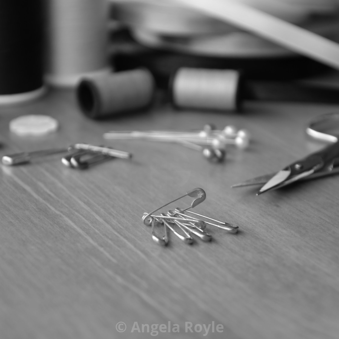 "Black and white safety pins." stock image
