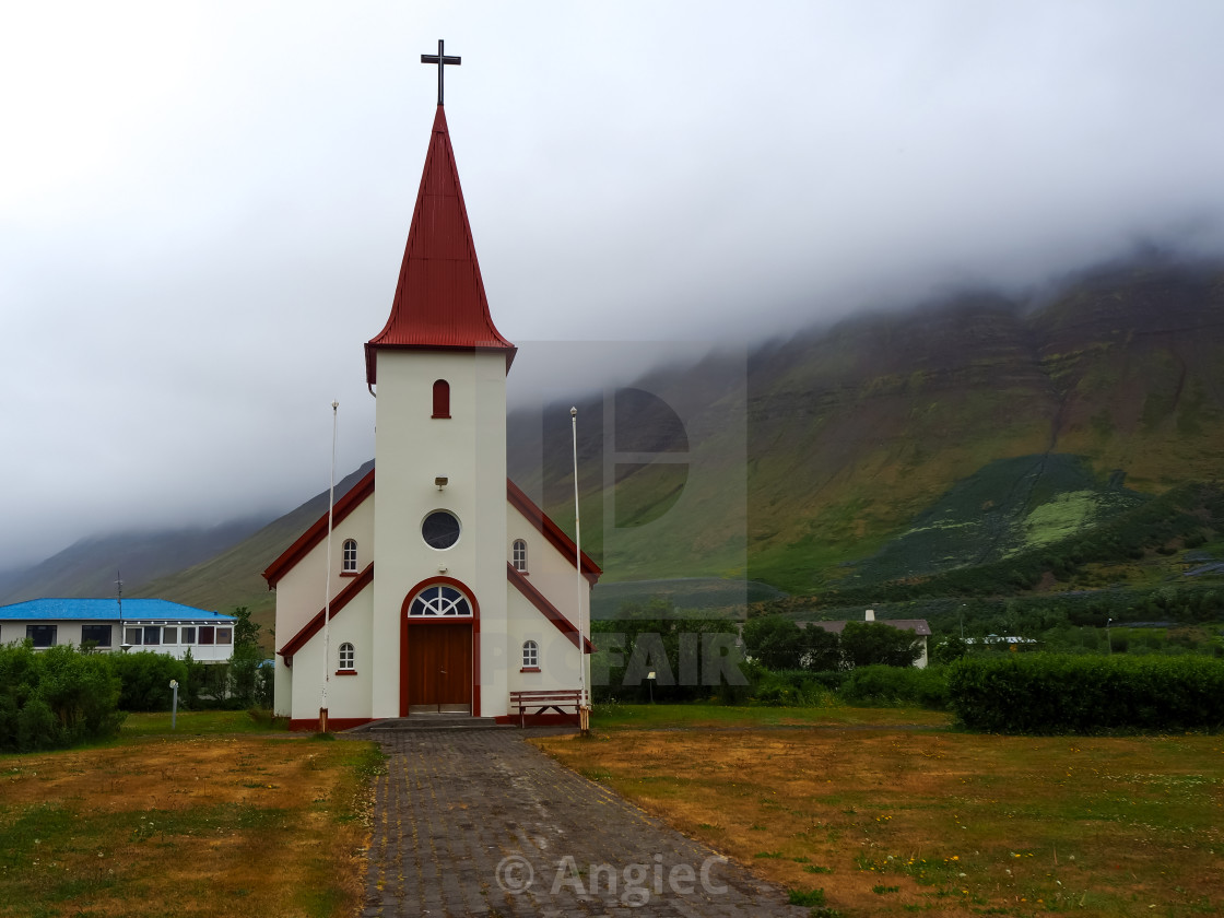 "Church in low cloud at Flateyri, Westfjords, Iceland" stock image