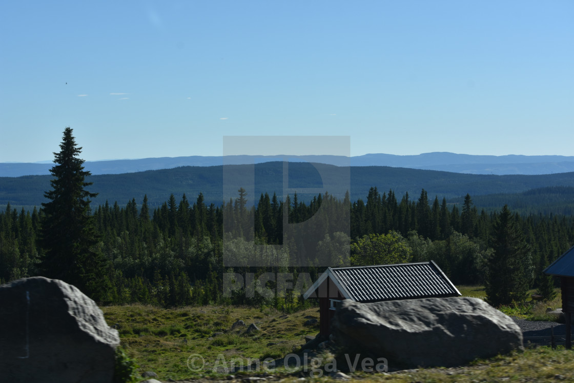 "Landscape with boulders and cabin" by Anne Olga Vea - $6.29 "Landscape with boulders and cabin" stock image