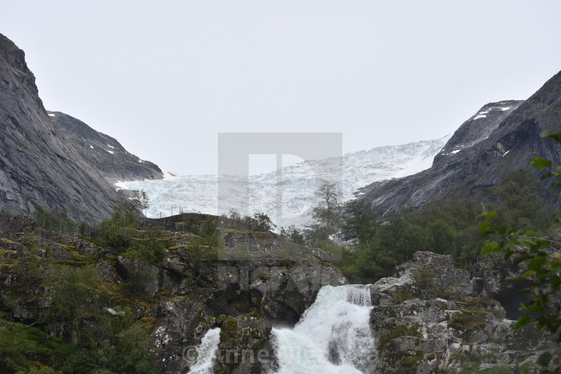 "briksdalsbreen with waterfall" stock image