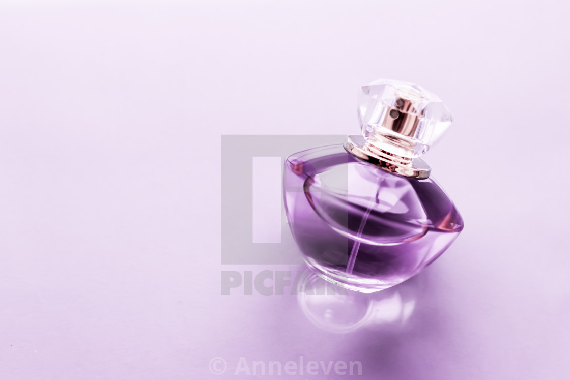 Perfume bottle on glossy background, sweet floral scent, glamour fragrance  and eau de parfum as holiday gift and luxury beauty cosmetics brand design, Stock image