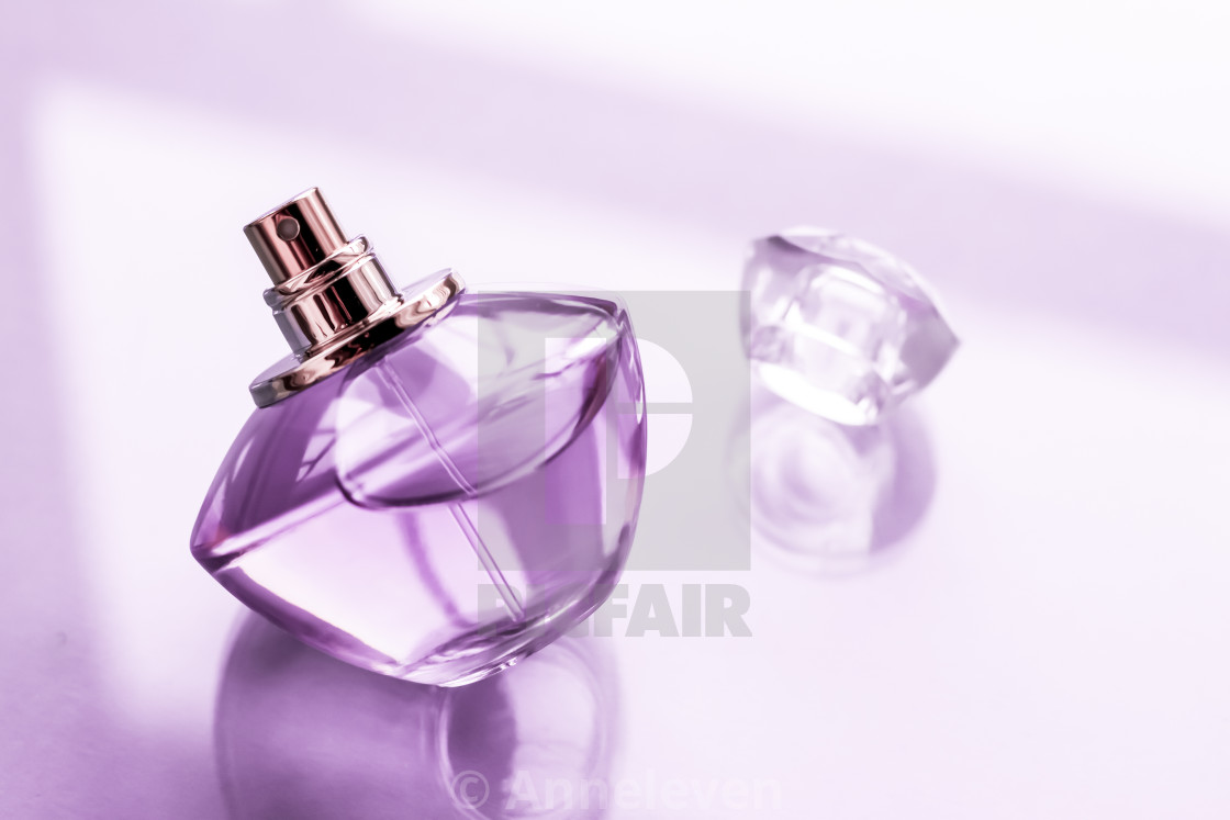 Pink perfume bottle on glossy background, sweet floral scent, glamour  fragrance and eau de parfum as holiday gift and luxury beauty cosmetics  brand design, Stock image