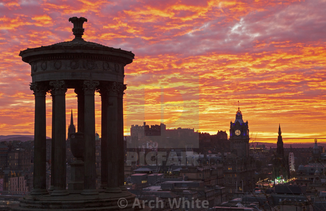 "UK weather: Stunning sunset over Edinburgh city centre, Scotland" by Arch White - $103.56 "UK weather: Stunning sunset over Edinburgh city centre, Scotland" stock image