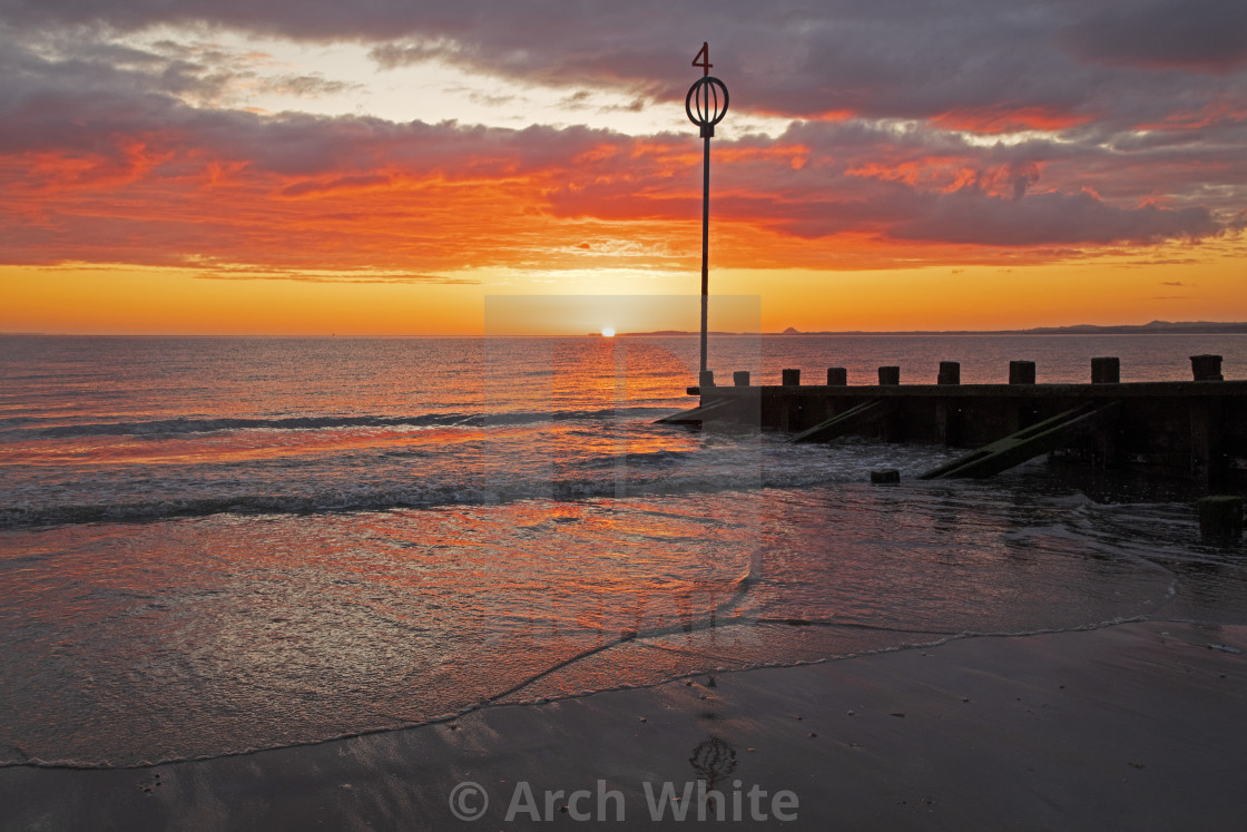 "UK weather: Cool sunrise at Portobello, Edinburgh, Scotland." by Arch White - $103.56 "UK weather: Cool sunrise at Portobello, Edinburgh, Scotland." stock image