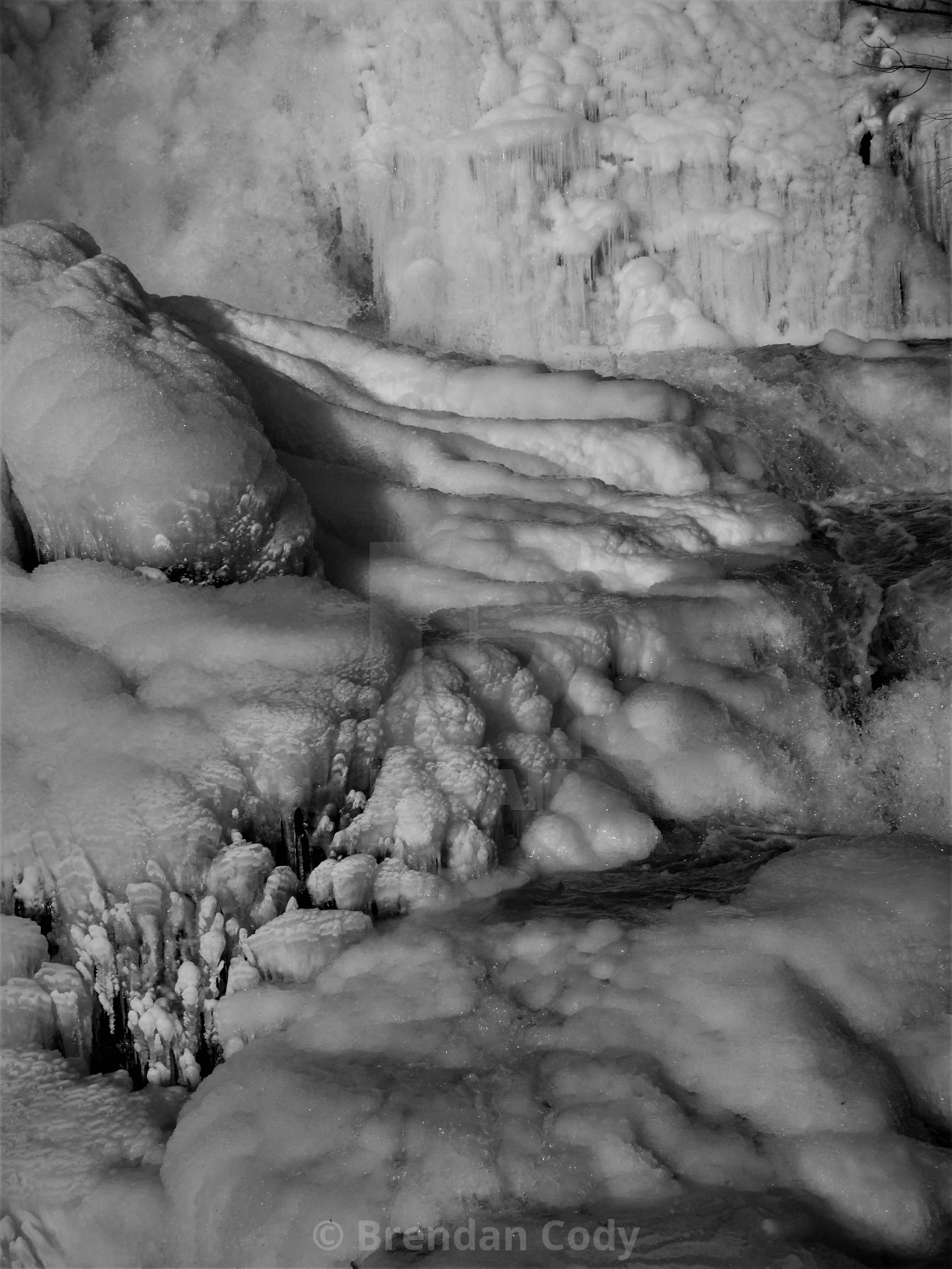 "The Frozen Waterfall" by Brendan Cody - $15.31 "The Frozen Waterfall" stock image