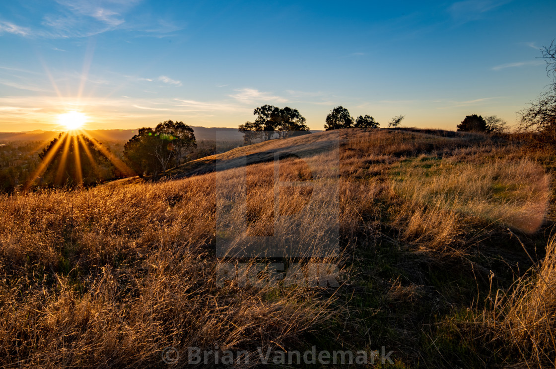 "Grassy Hill Sunset" stock image