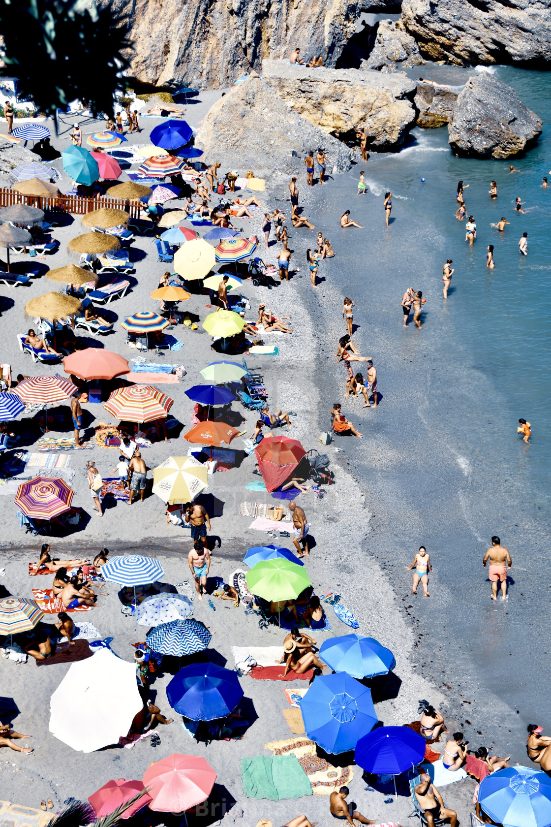 "Sunbathers in Nerja" stock image