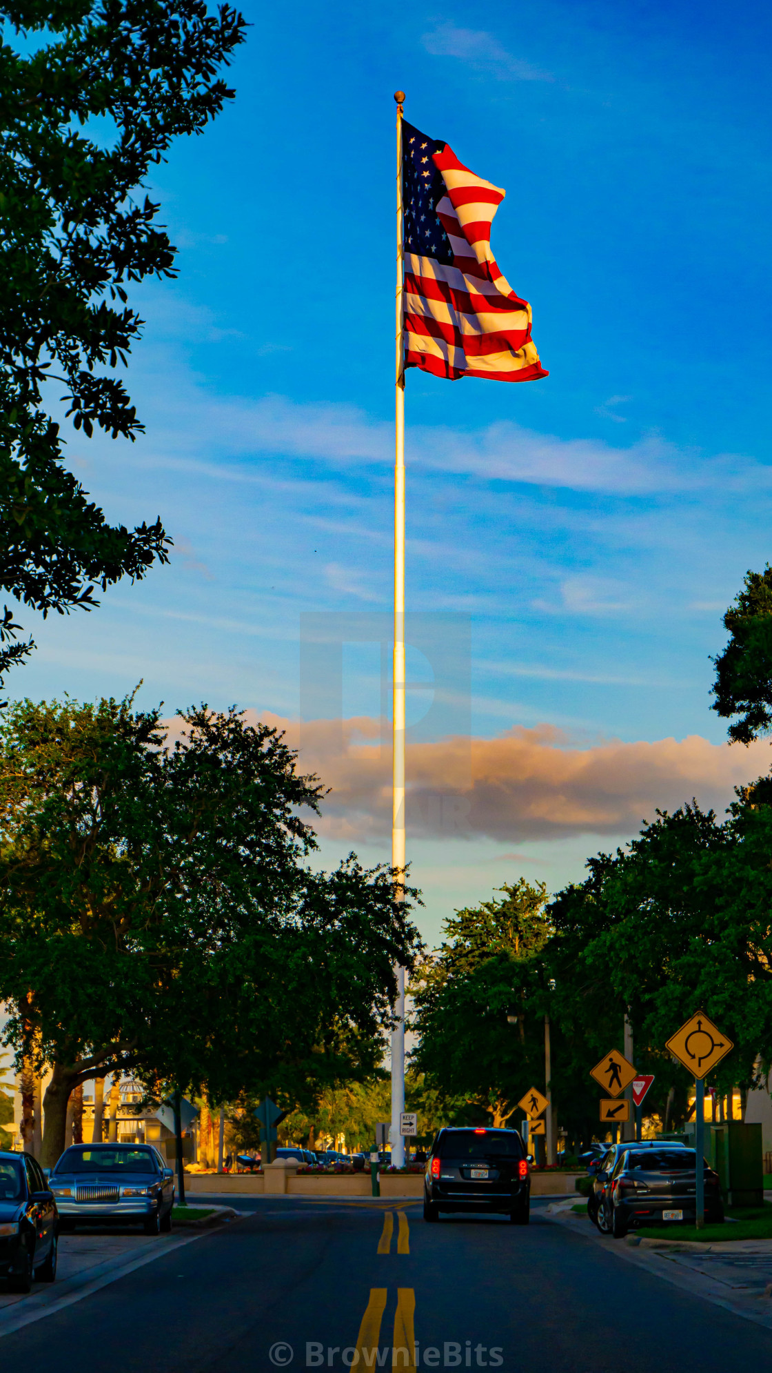 "Roundabout Flag" by BrownieBits - $15.39 "Roundabout Flag" stock image
