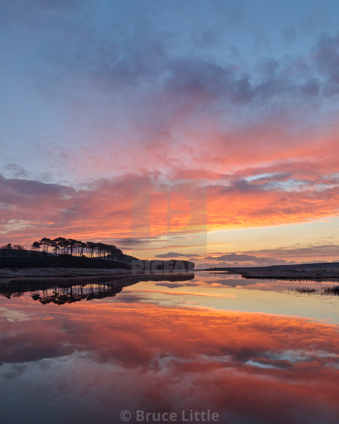 "New Years Sunrise at Budleigh Salterton" by Bruce Little - $30.86 "New Years Sunrise at Budleigh Salterton" stock image