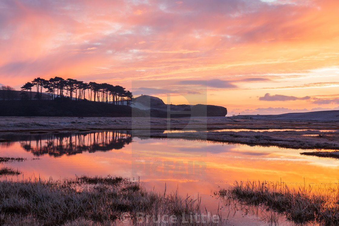 "Fiery Sunrise at Budleigh Salterton" by Bruce Little - $30.86 "Fiery Sunrise at Budleigh Salterton" stock image