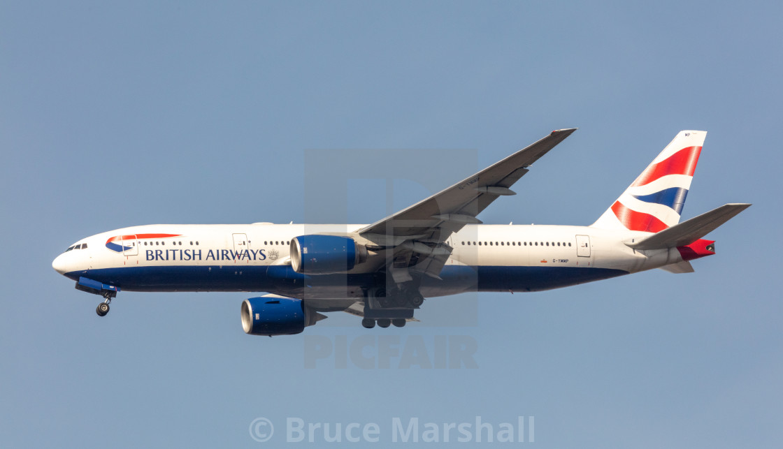 "British Airways Boeing 777-236(ER) in flight" stock image