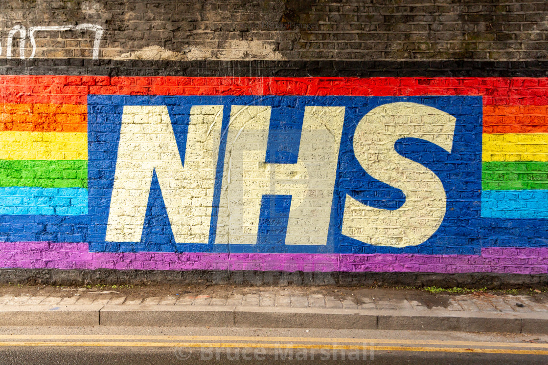 "NHS logo inset in rainbow" stock image