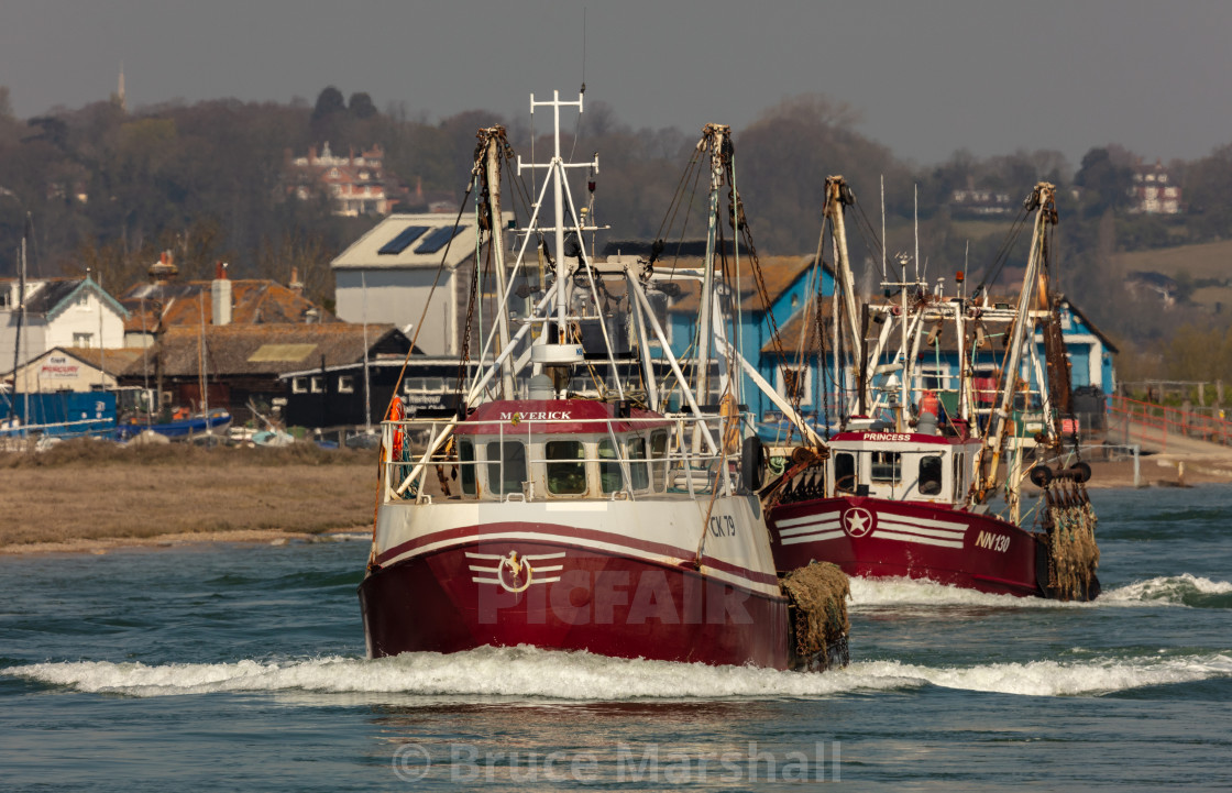 "Maverick and Princess Fishing boats heading out to sea" stock image