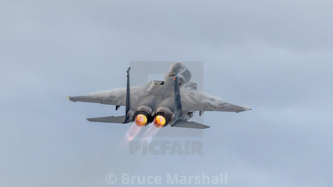 "USAF F15E 48FW on unrestricted climb" stock image