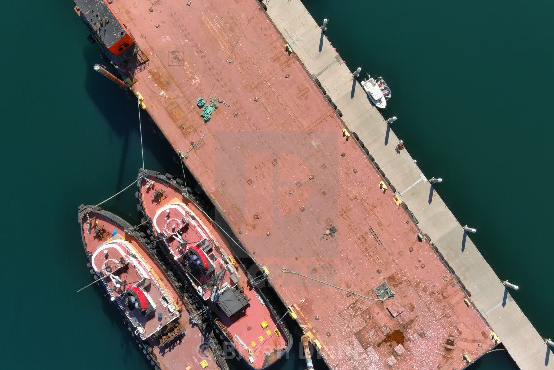 "Barge and Tugs Awaiting Orders" stock image