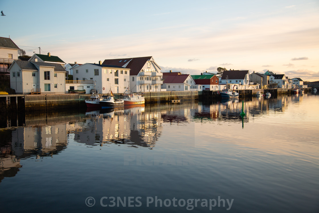 "Henningsvær with afternoon sun" stock image