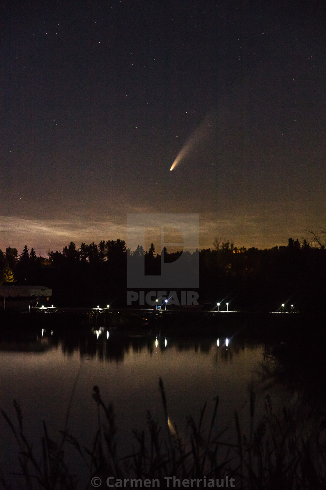 "Comet reflecting over lake" by Carmen Therriault - $15.31 "Comet reflecting over lake" stock image