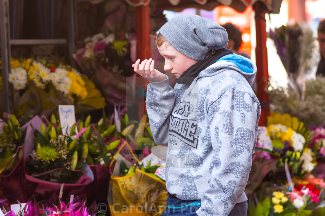 "Cold flower seller" stock image