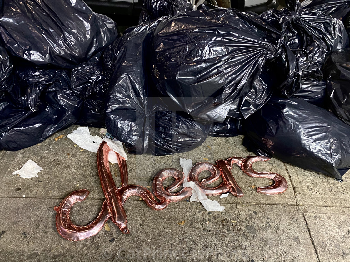 "Yesterday’s cheer, today’s trash" by CatPrincessPhoto - $71.02 "Yesterday’s cheer, today’s trash" stock image