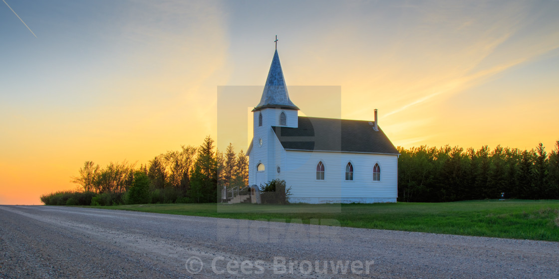 "Sunset over country church" stock image