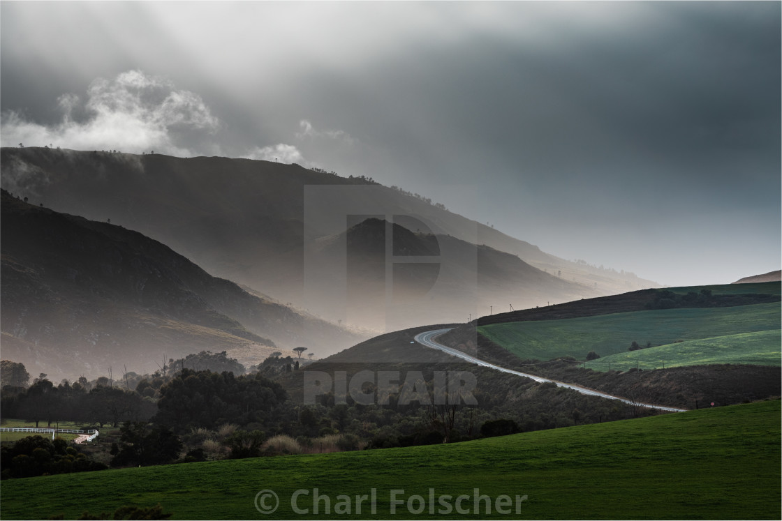 "Valleys and Sun Rays" by Charl Folscher - £12.40 "Valleys and Sun Rays" stock image