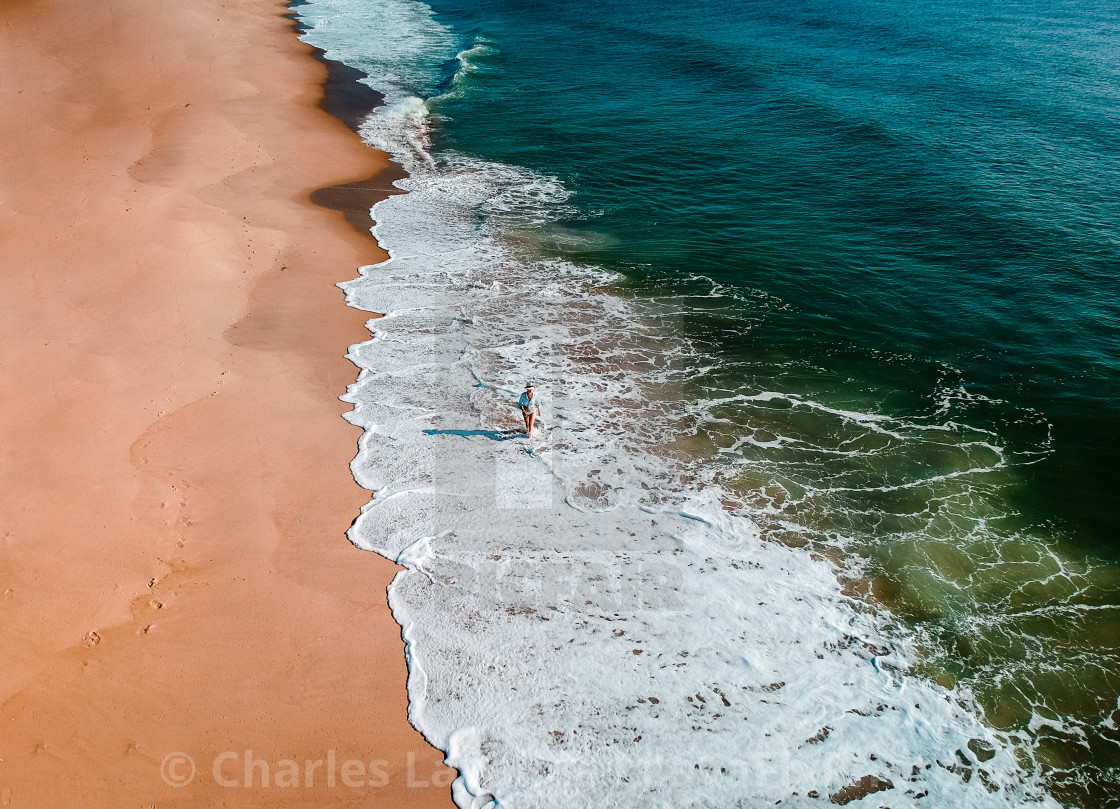 "Lone Woman on the Beach" stock image