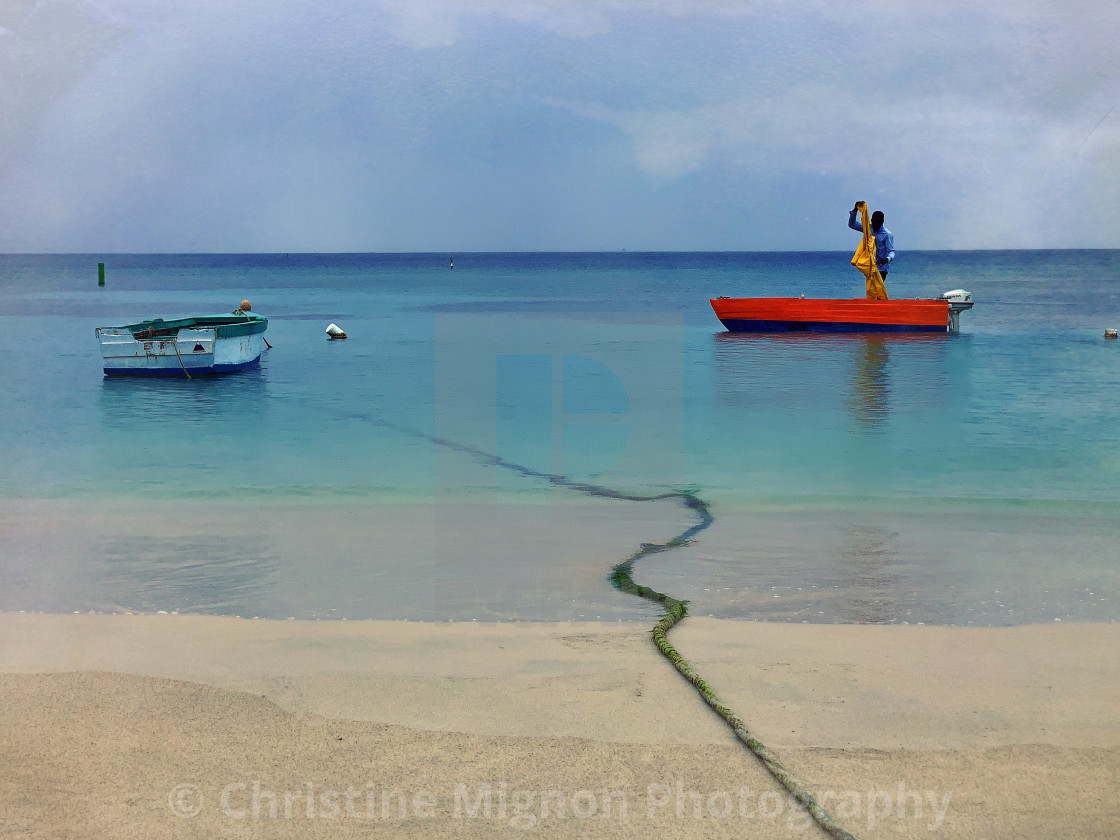 "Red boat, yellow jacket" stock image