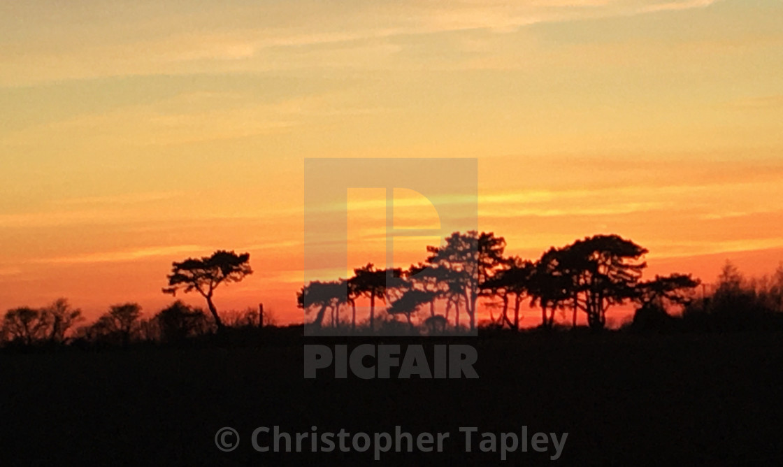 "Beautiful sunset in a troubled world" stock image