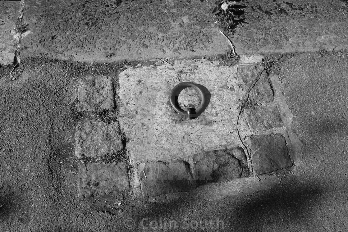 "Mooring ring on the canal towpath." stock image