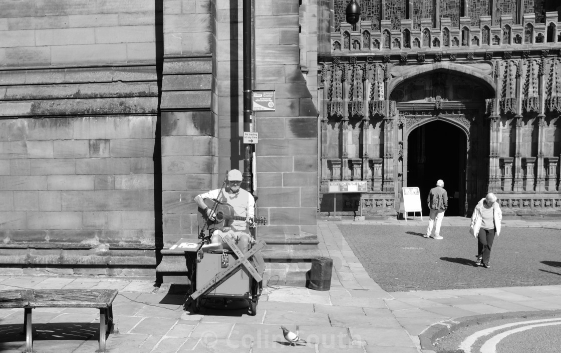 "Cathedral busker" stock image