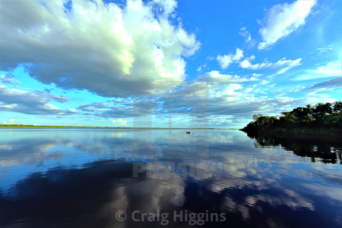 "Florida clouds and water reflections" stock image