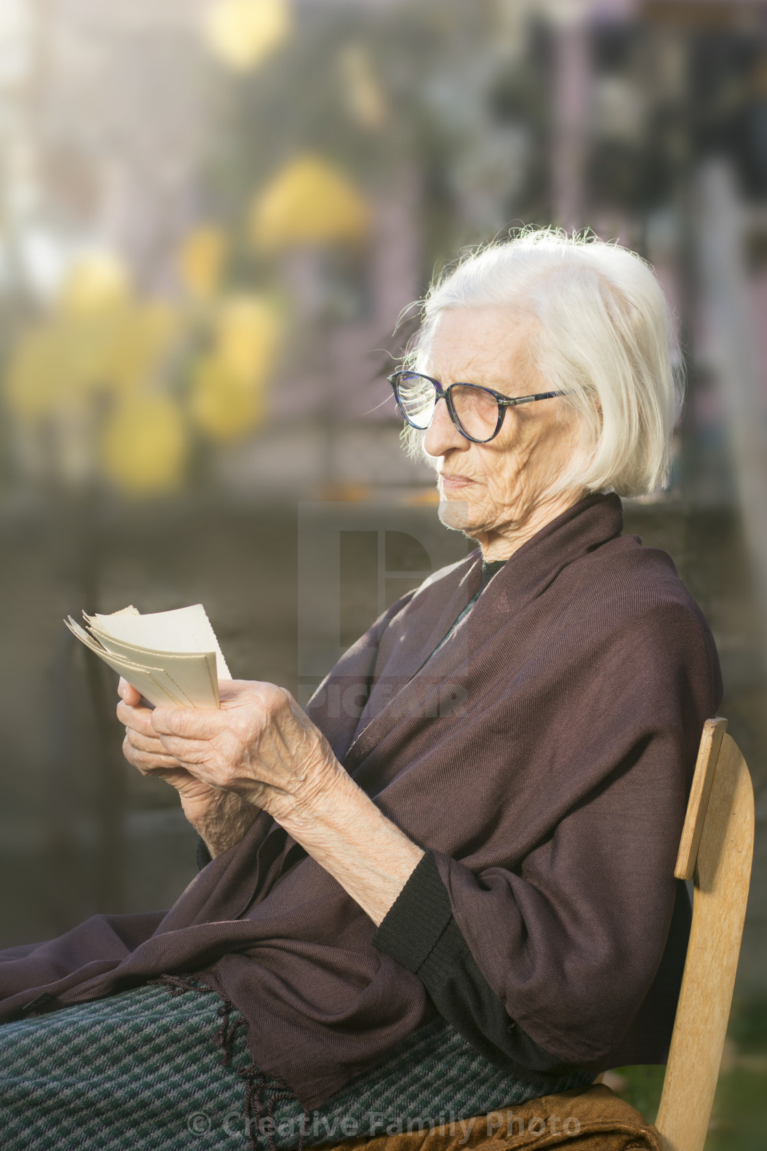 "Grandma looking at some very old photos" stock image