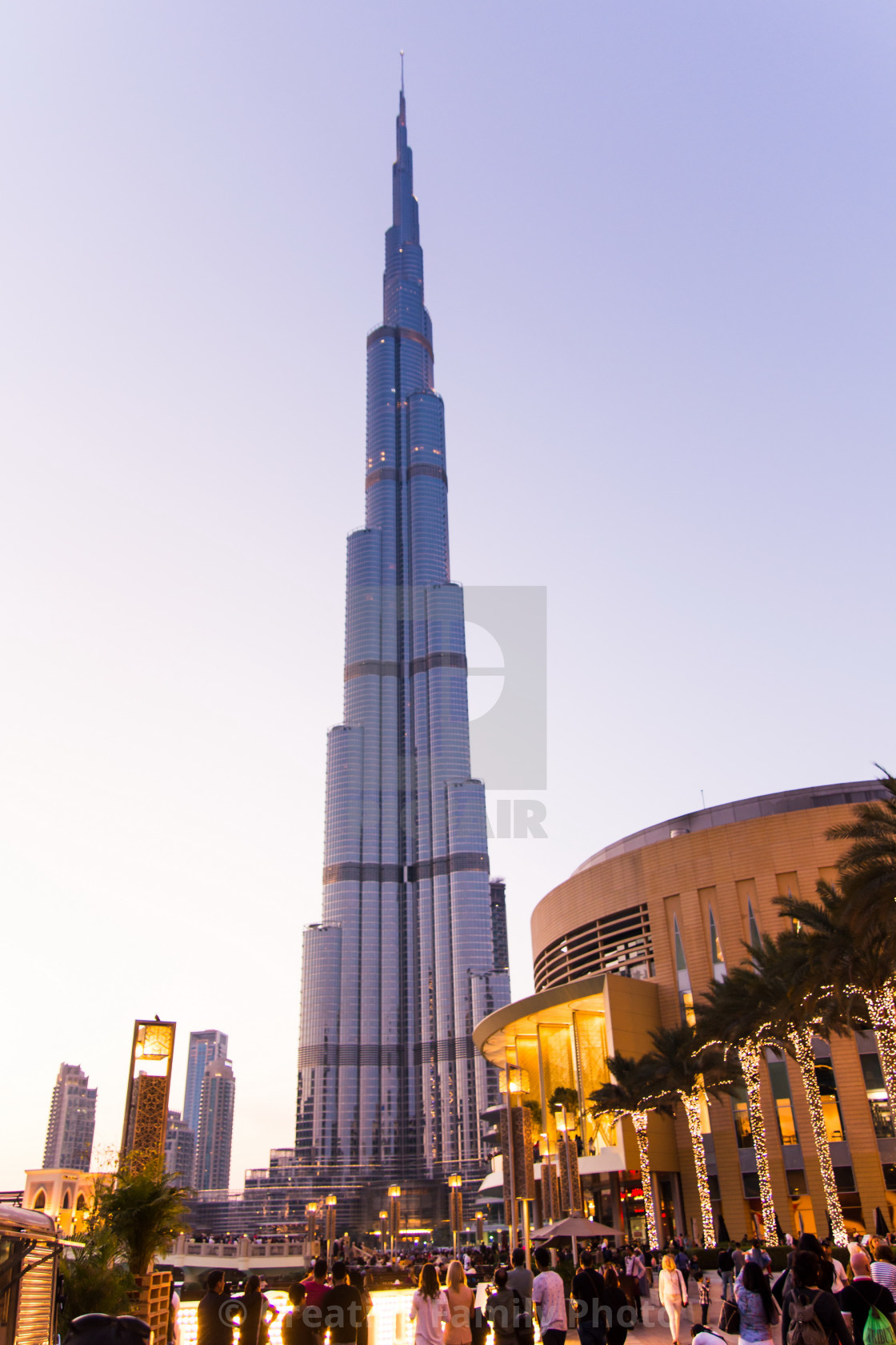 Burj Khalifa and the Dubai mall building at dusk - License, download or print for £ | Photos | Picfair Burj Khalifa and the Dubai mall building at dusk - License, download or print for £ | Photos | Picfair