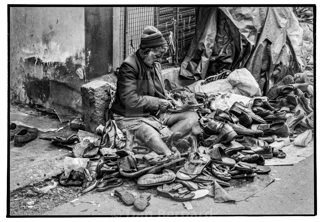 "Boot mender, Ooty, Tamil Nadhu, India" stock image