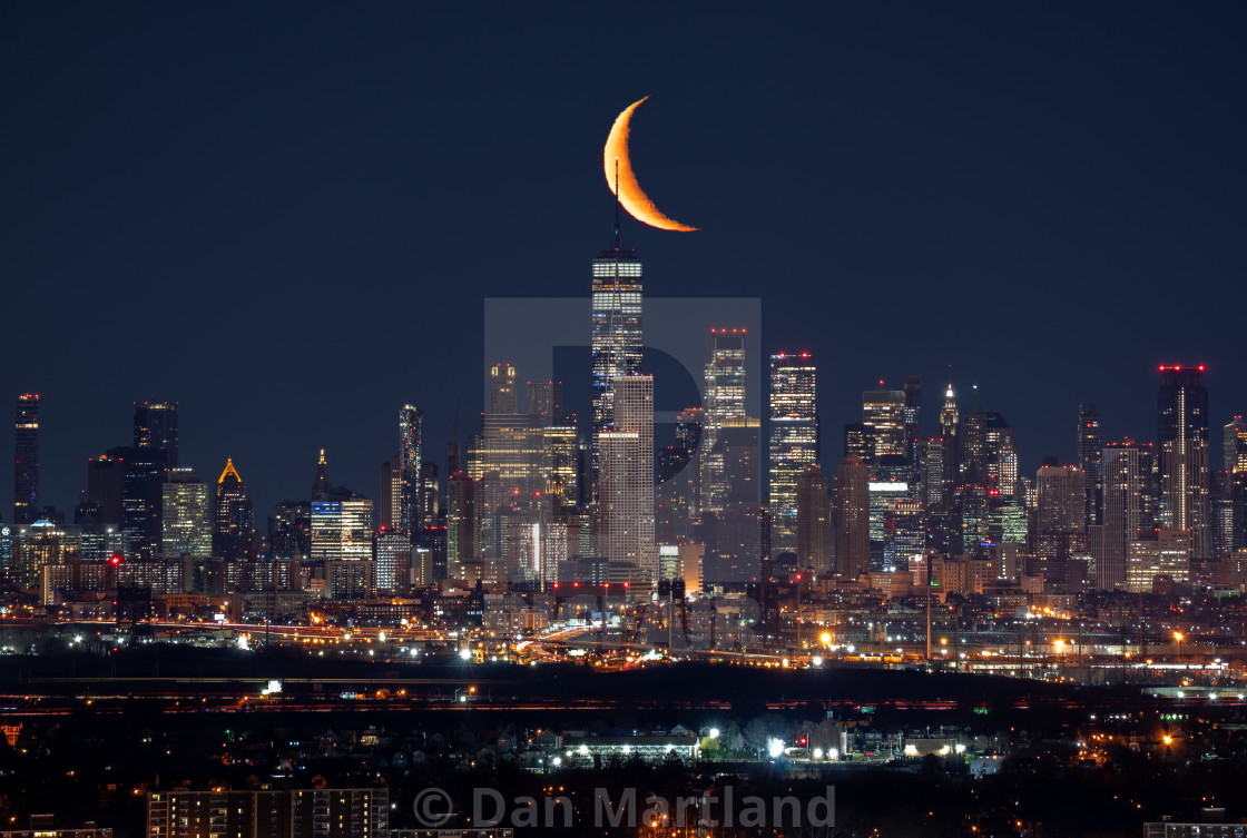 "Crescent Moon rising above One World Trade Center." stock image