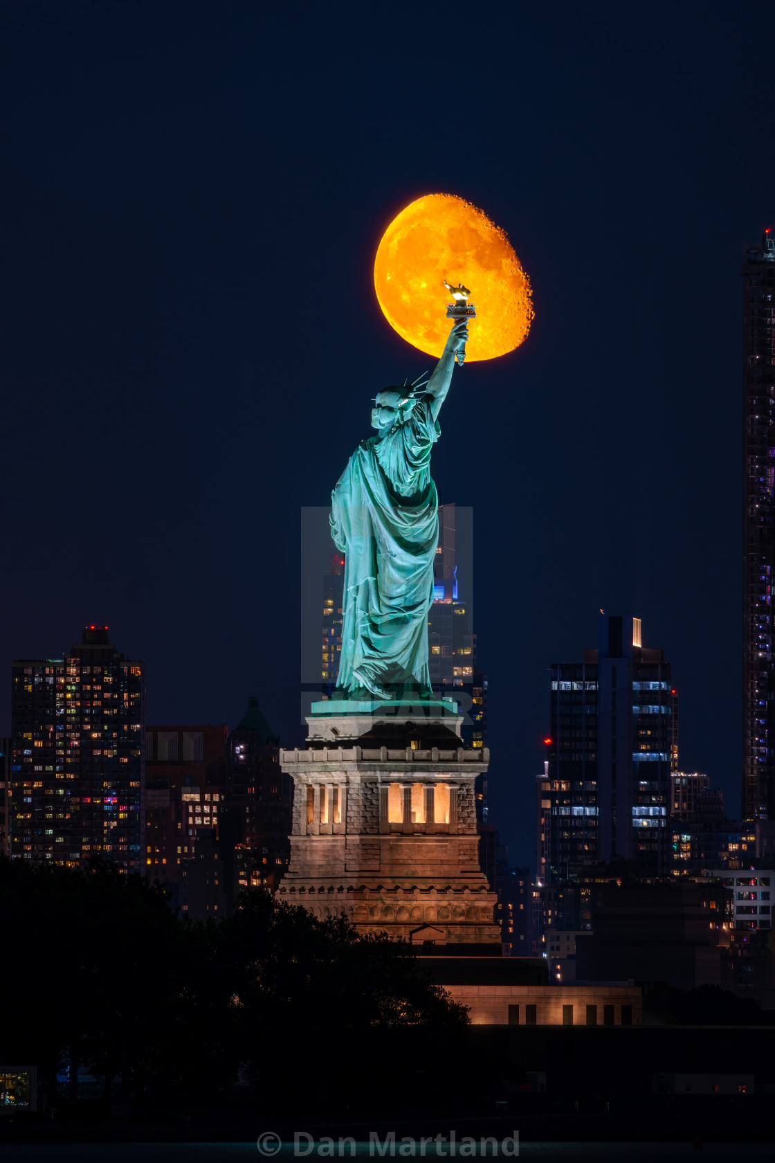 "Lady Liberty and the moon" stock image