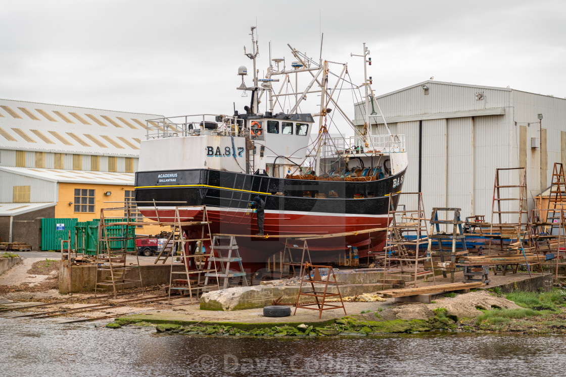 "Fishing Boat undergoing Repairs, Girvan, Dumfries & Galloway, Scotland" stock image