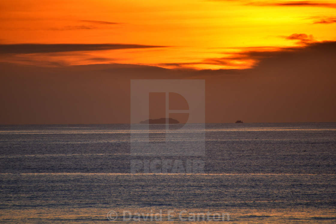 "Grassholm Island at sunset." stock image