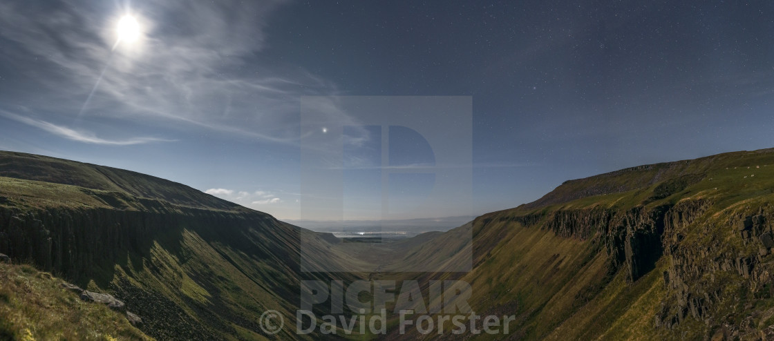 "Moonlight Illuminating High Cup Nick at Night, Cumbria, UK" stock image