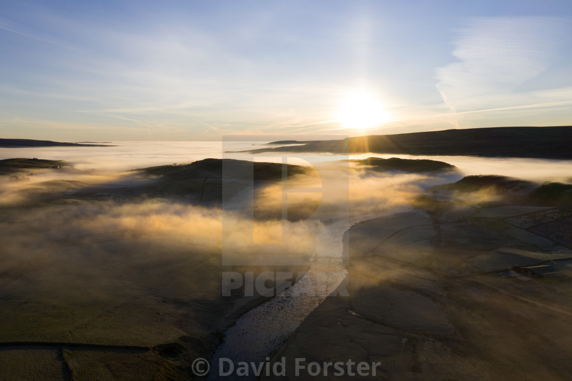 "Mist and Fog at Sunrise in Upper Teesdale, County Durham, UK" stock image