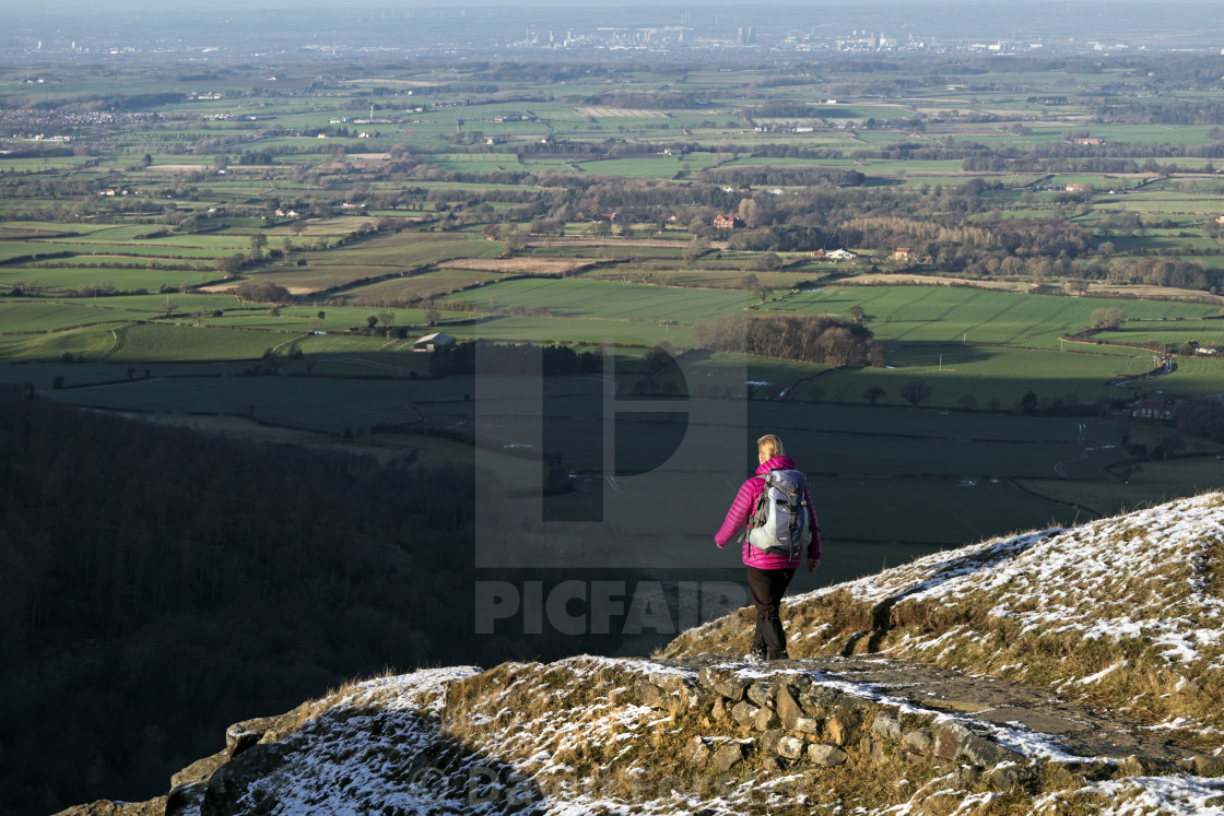 "Walker on the Cleveland Way at Urra Moor in Winter, North Yorkshire" stock image