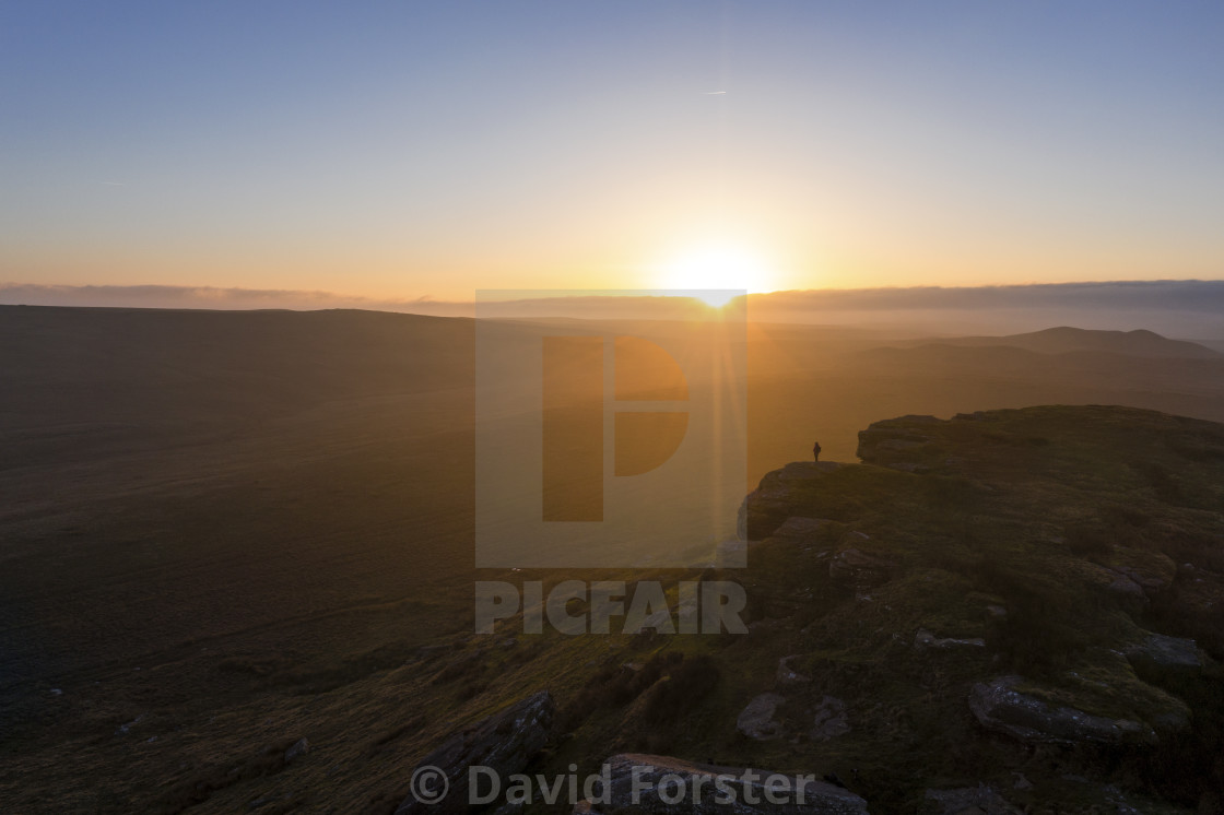 "Goldsborough Hill and Walker at sunset, Teesdale, County Durham, UK" stock image