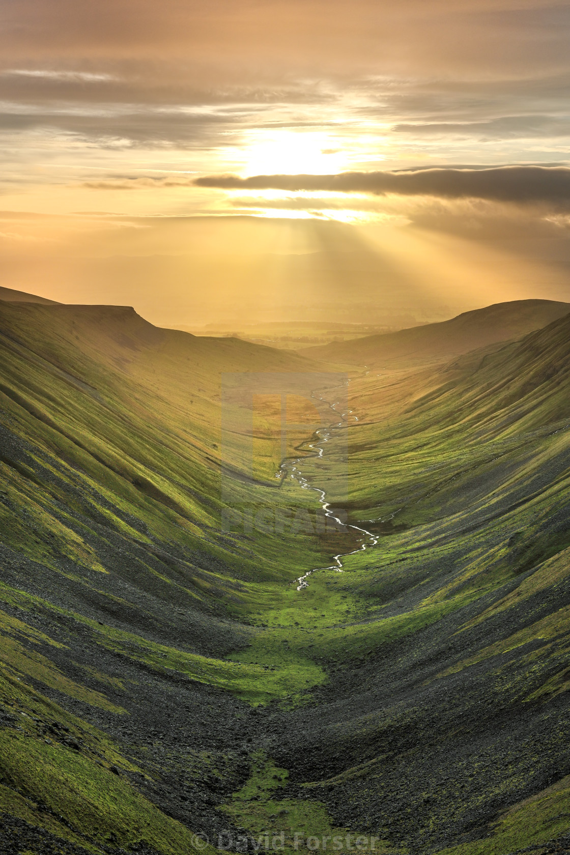 "The glaciated valley of High Cup viewed from High Cup Nick at sunset, North Pennines, Cumbria, UK" stock image