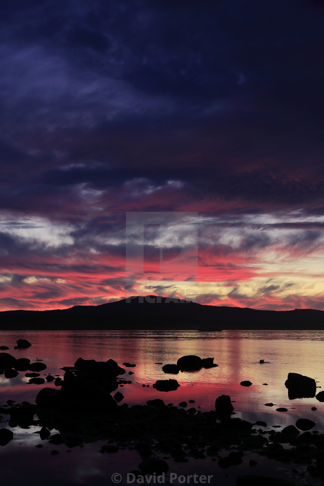 "Sunset over the Gulf of Admiral Montt, Puerto Natales city, Patagonia, Chile,..." stock image