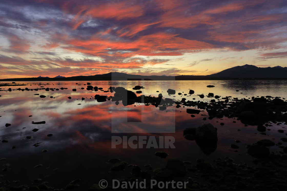 "Sunset over the Gulf of Admiral Montt, Puerto Natales city, Patagonia, Chile,..." stock image